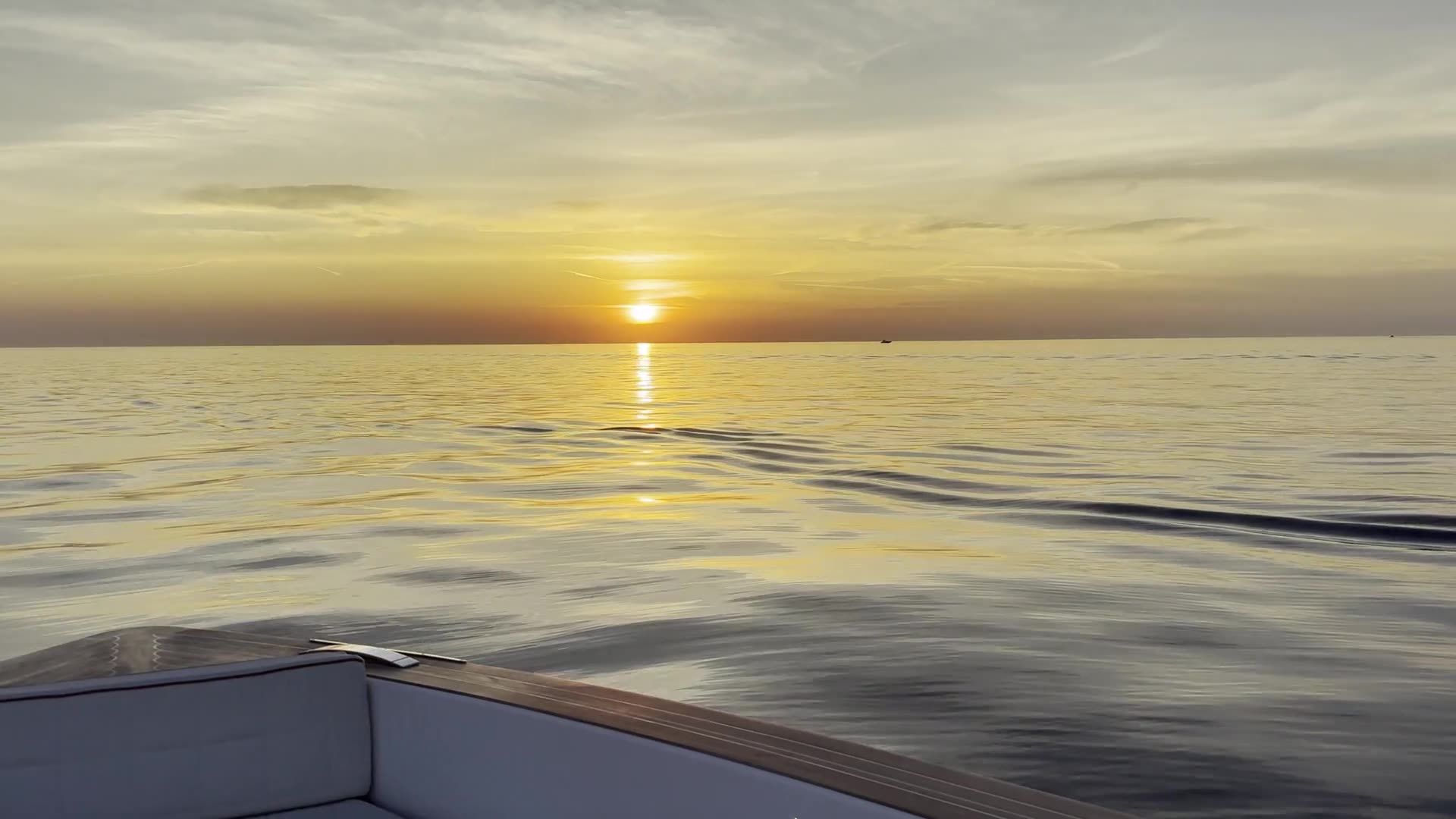 Golden hour over the water from the deck